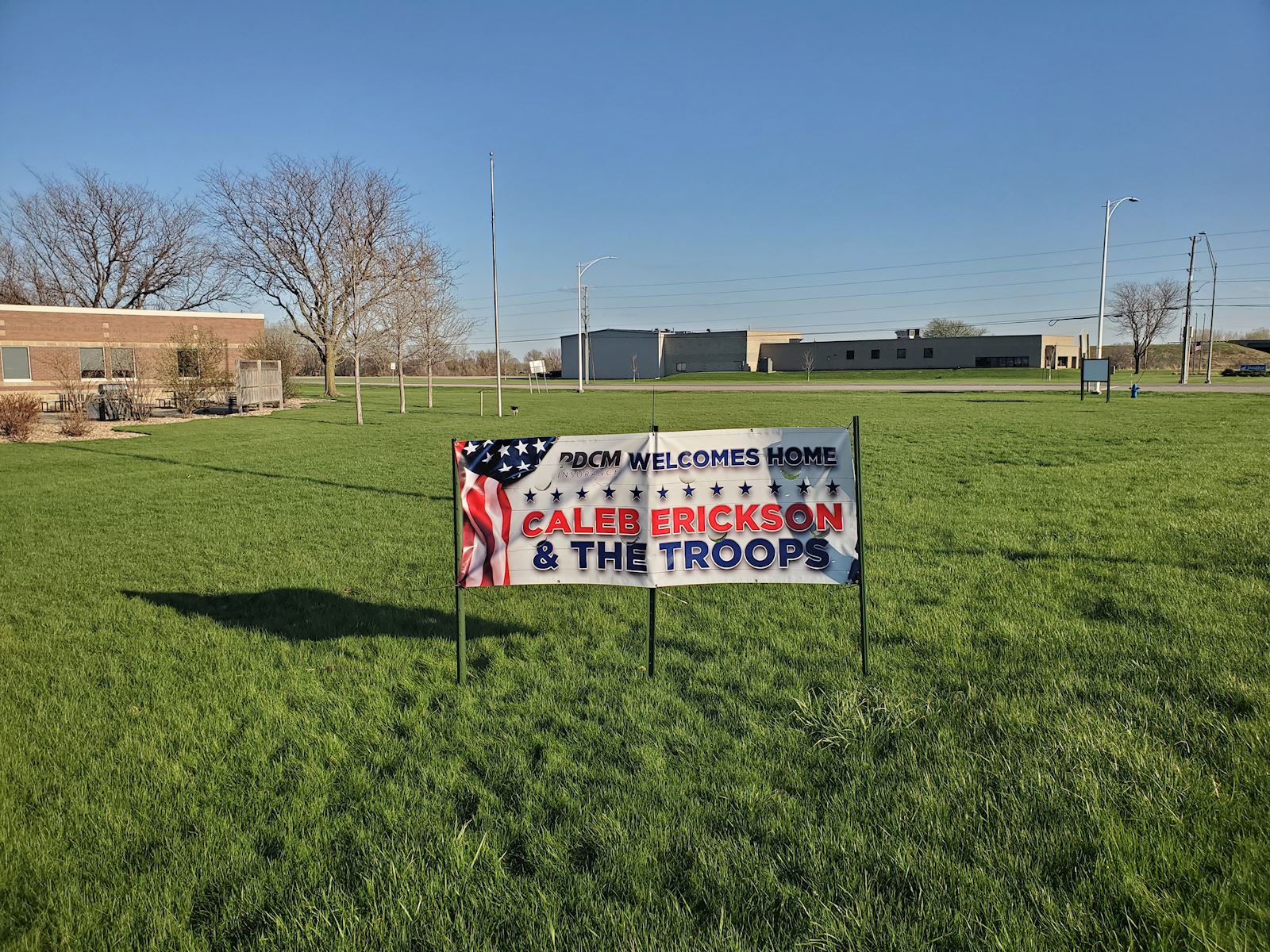 PDCM lawn with Welcome Home sign.