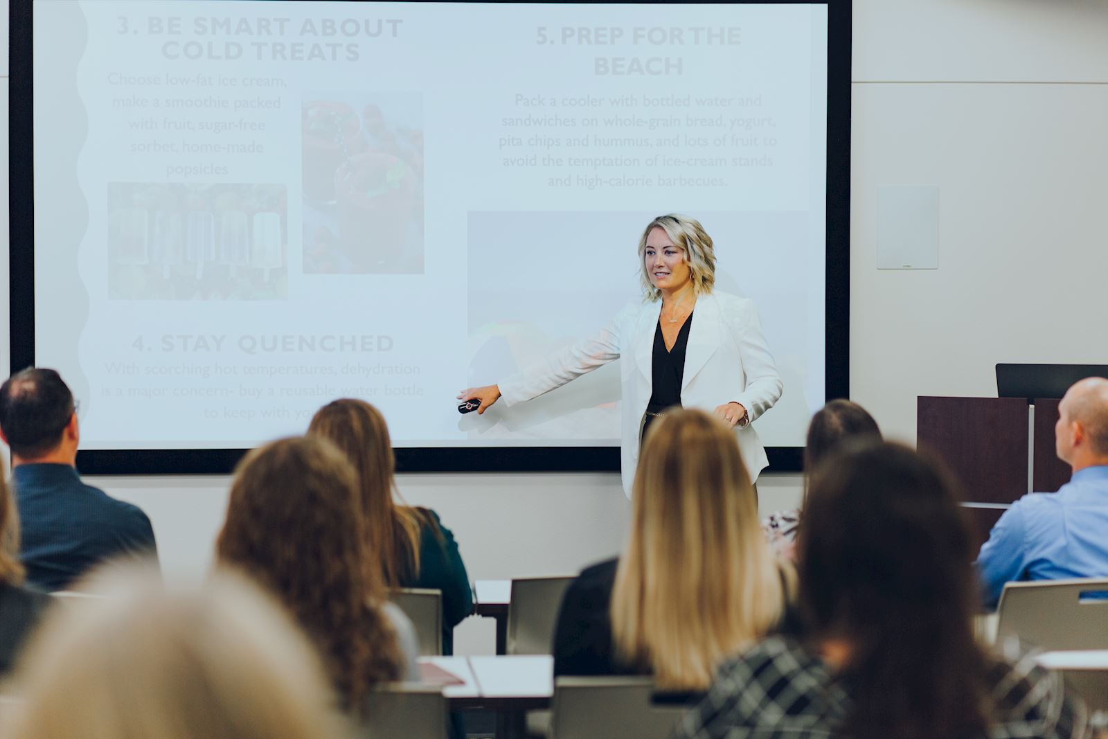 Liz D. presenting in the Smarter Center.