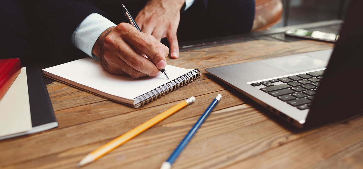 Man writing on paper